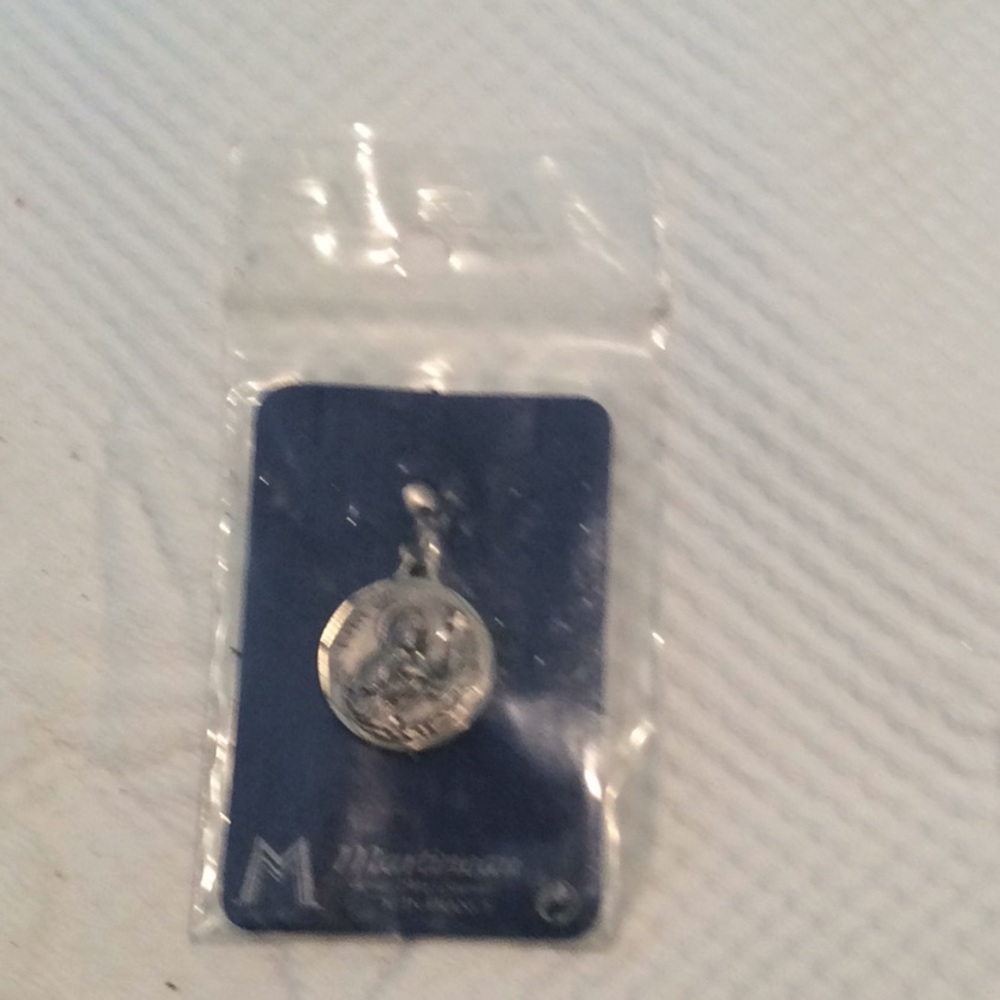 New. St Rita medal.